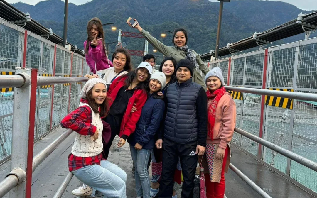 Happy Yoga International students at Rishikesh Ram Jhula